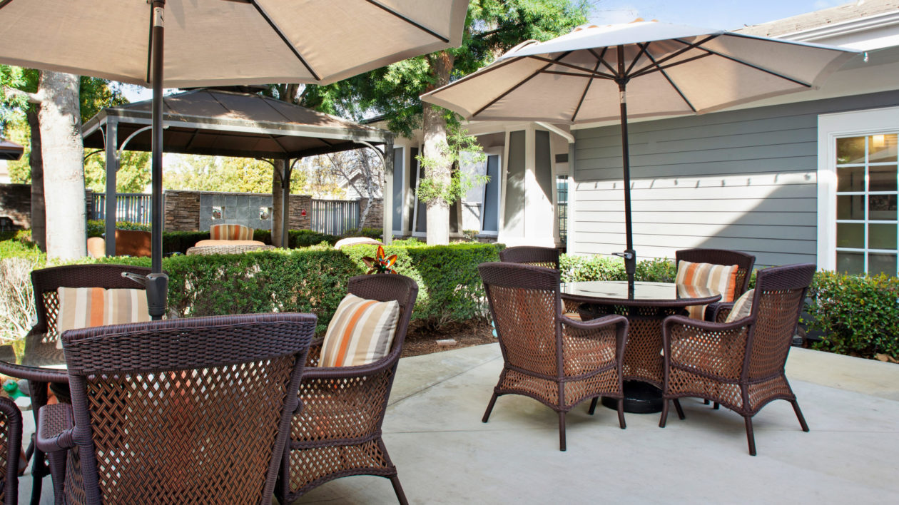 Brandford patio with tables chairs and umbrellas