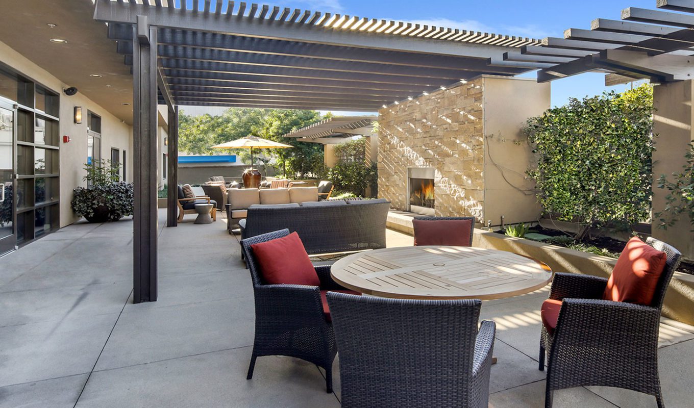 Burbank outside patio with seating areas and fire place