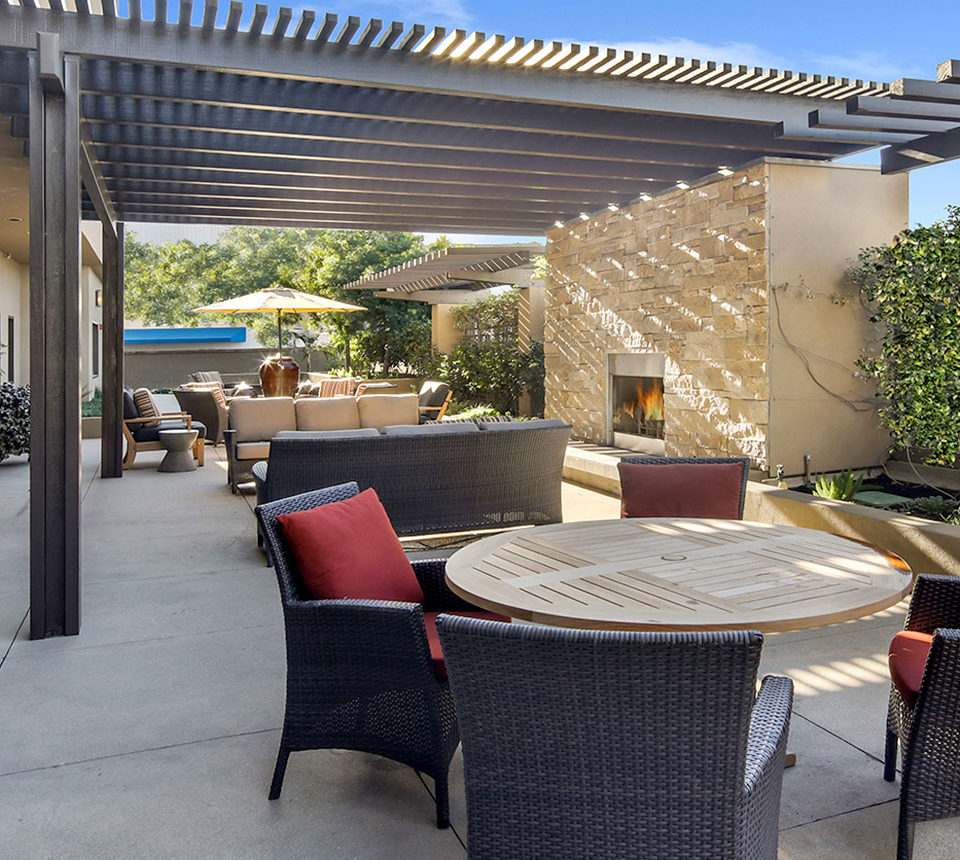 Burbank outside patio with seating areas and fire place