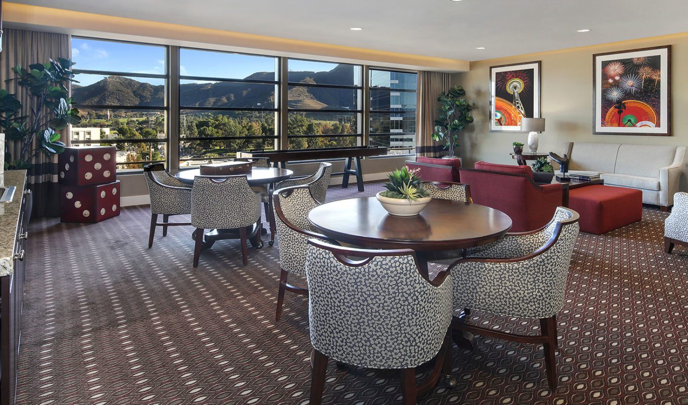 Burbank lounge with seating areas and view of mountains
