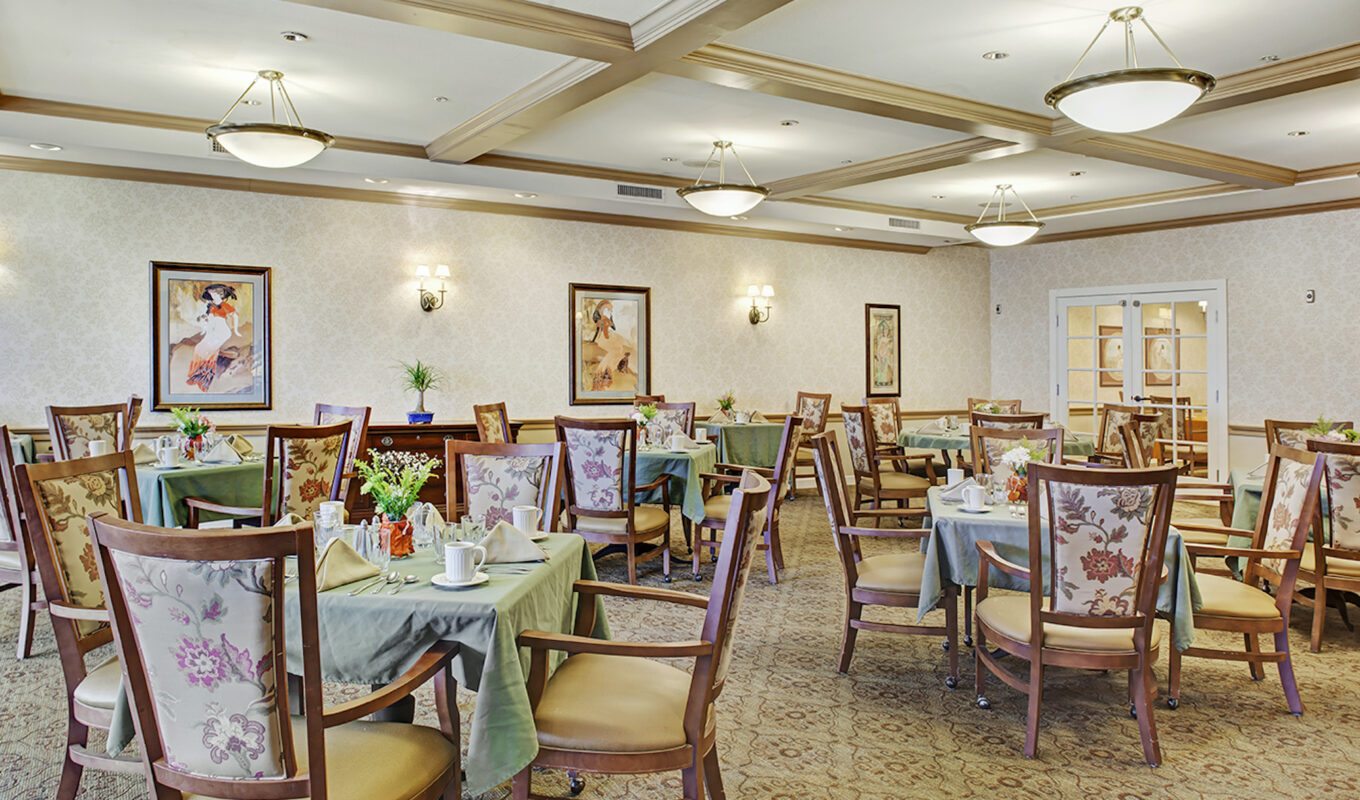 Ivy Park at La Jolla living room area with chairs around tables
