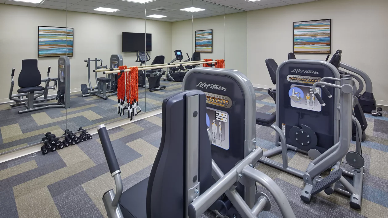 indoor workout room with equipment