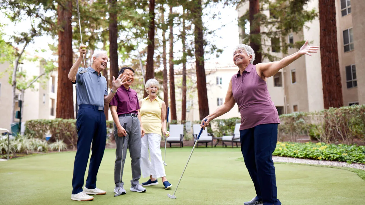 group-of-seniors-laughing-playing-golf-together